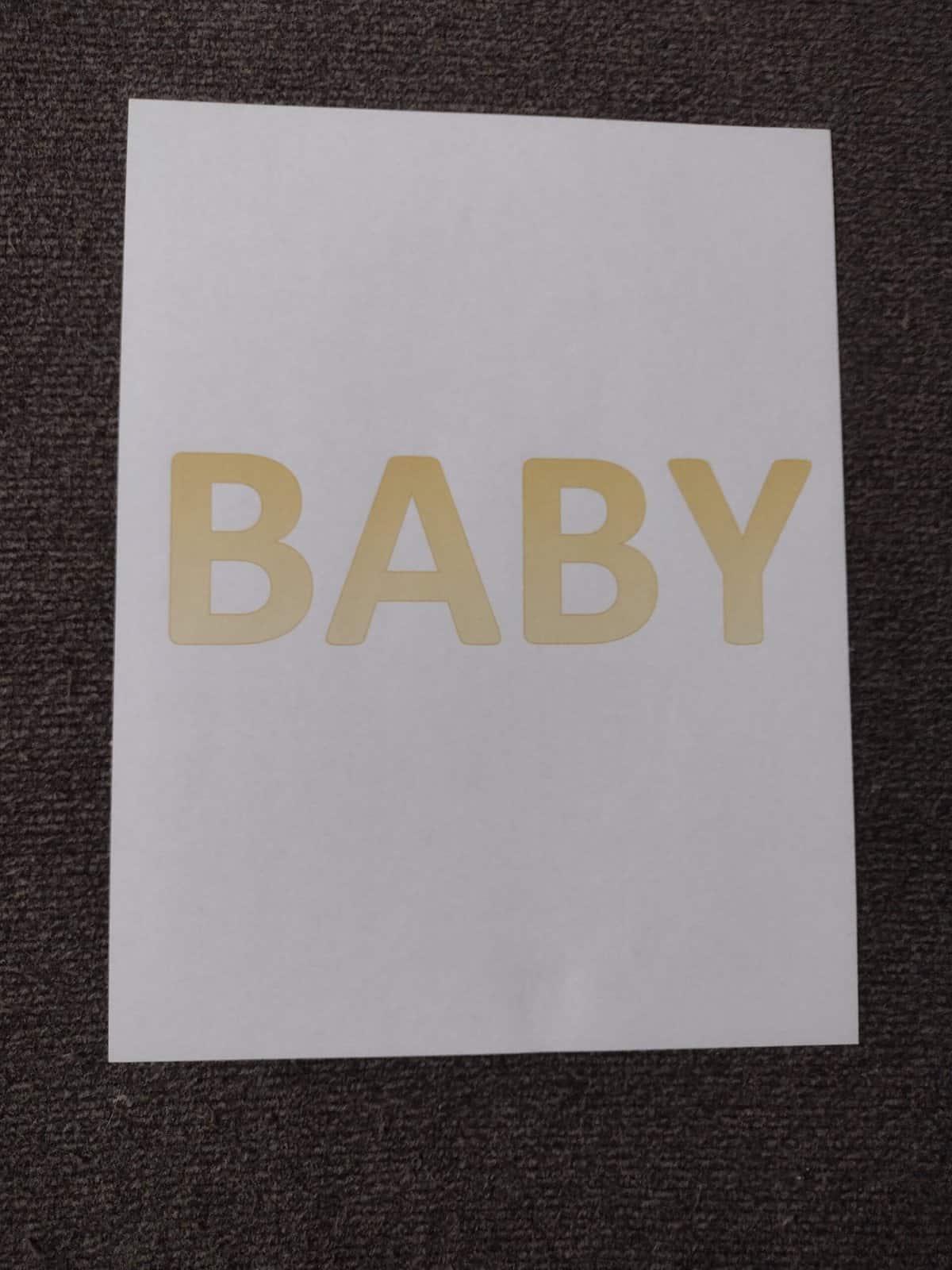 Picture of paper with word "baby" printed on it