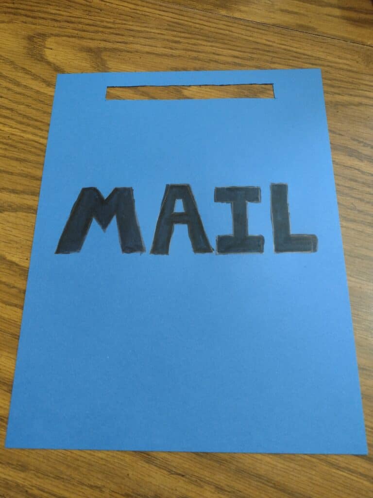 Picture of blue cardstock labeled Mail