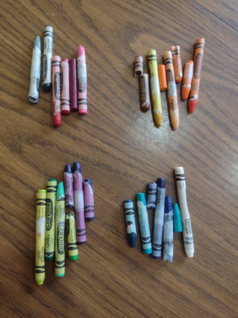 Picture of crayons sorted into four piles