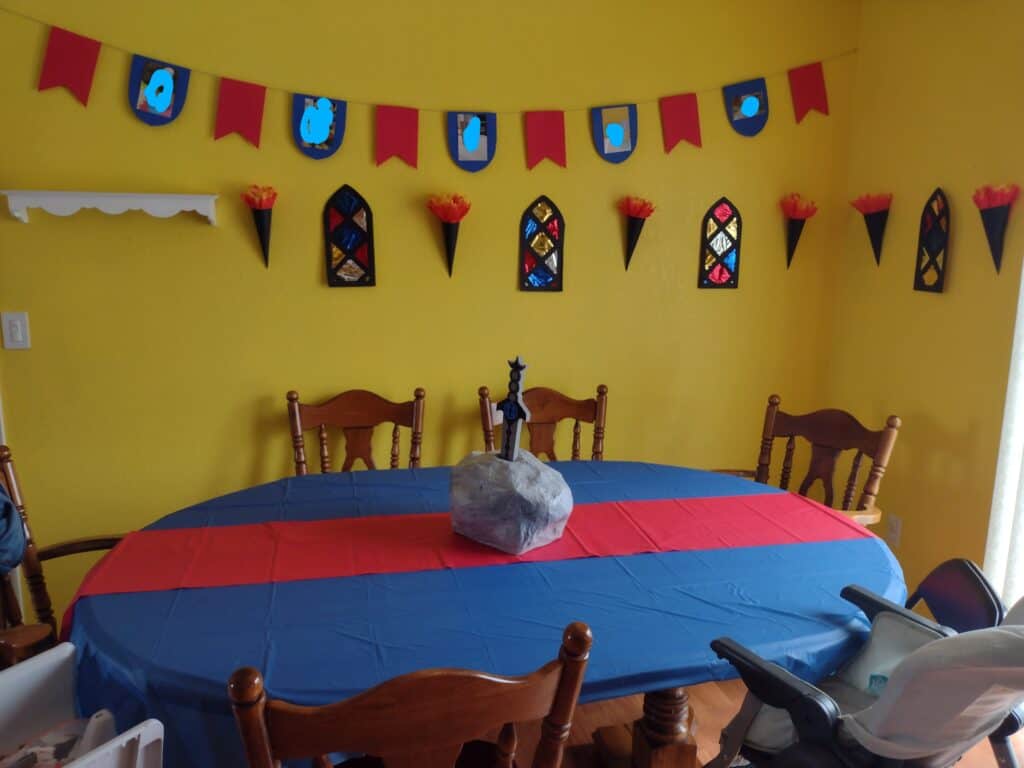 Picture of decorations for a knight and dragon themed birthday party