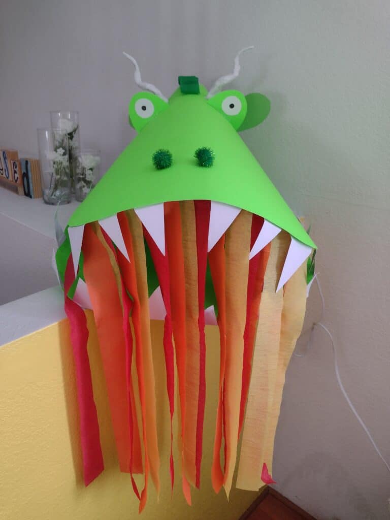 Picture of a fire breathing dragon craft decoration for a one year old birthday