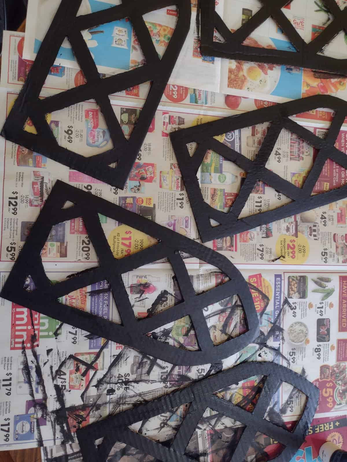 Picture of cardboard stained glass windows painted black