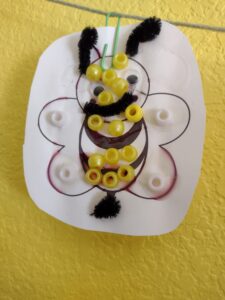Picture of a finished bee craft hanging up