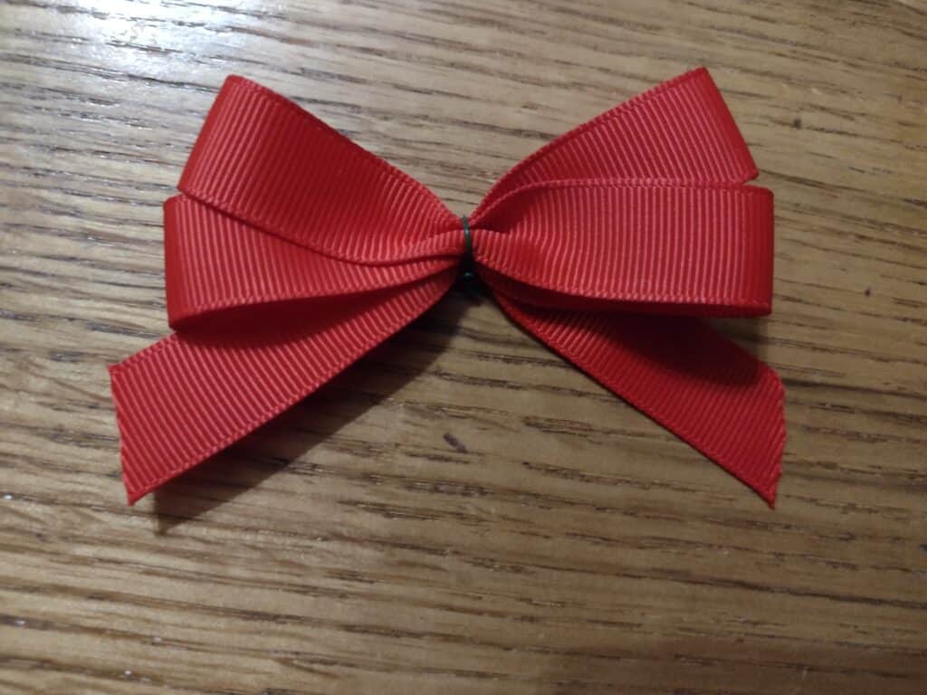 Picture of a homemade red hair bow