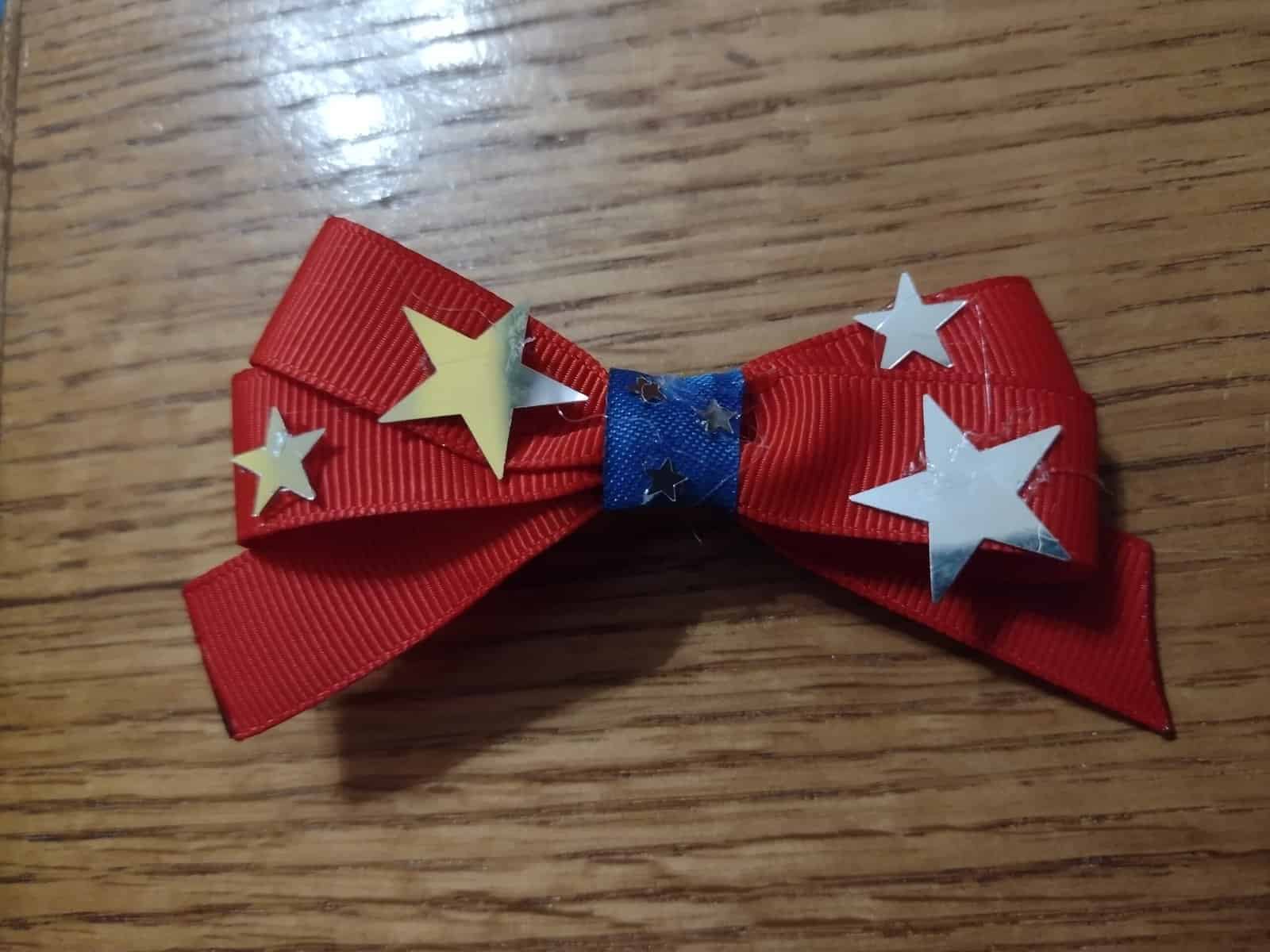 Picture of DIY 4th of July hair bows with silver confetti stars