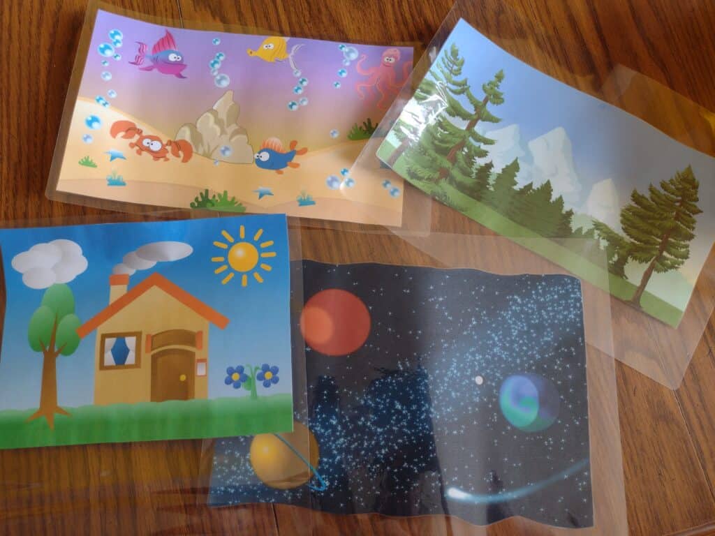Picture of laminated Play Doh mats with extra lamination around the outside