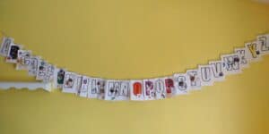 Picture of an alphabet craft with letters A to Z with pictures, stickers, dots, colors, and snacks on the letters