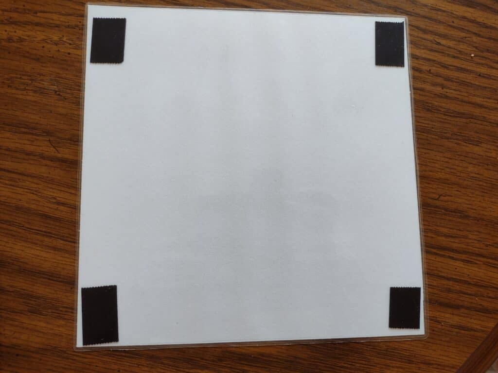 Picture of magnetic tape stuck on the back of a laminated sheet of paper