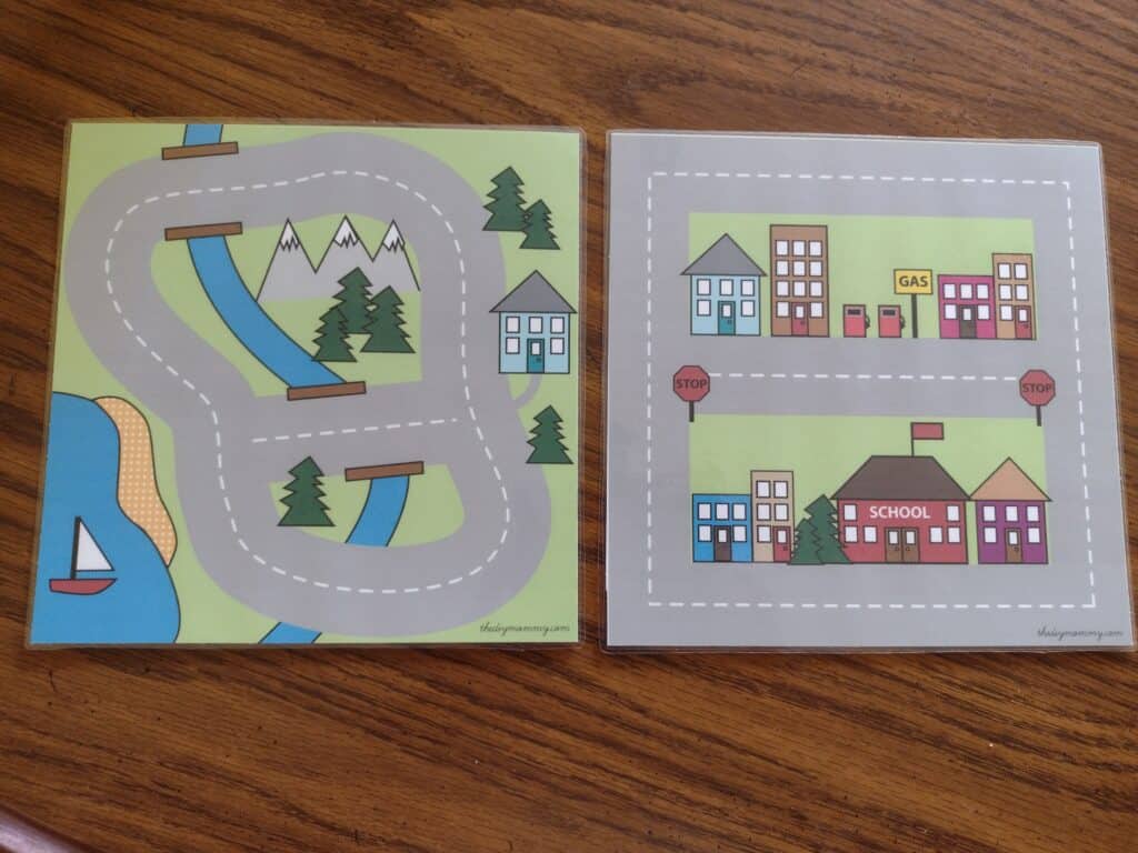 Picture of two laminated road maps  side by side