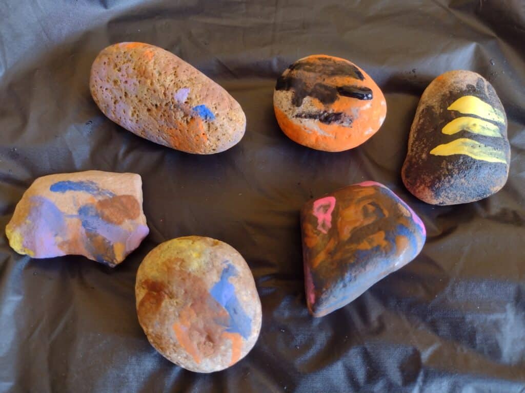 Picture of rocks painted by a preschooler and a toddler