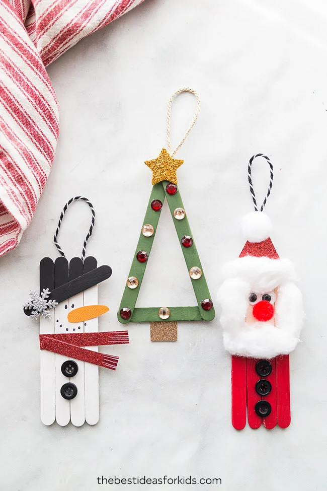 Picture of a snowman, Christmas tree, and Santa popsicle stick ornament