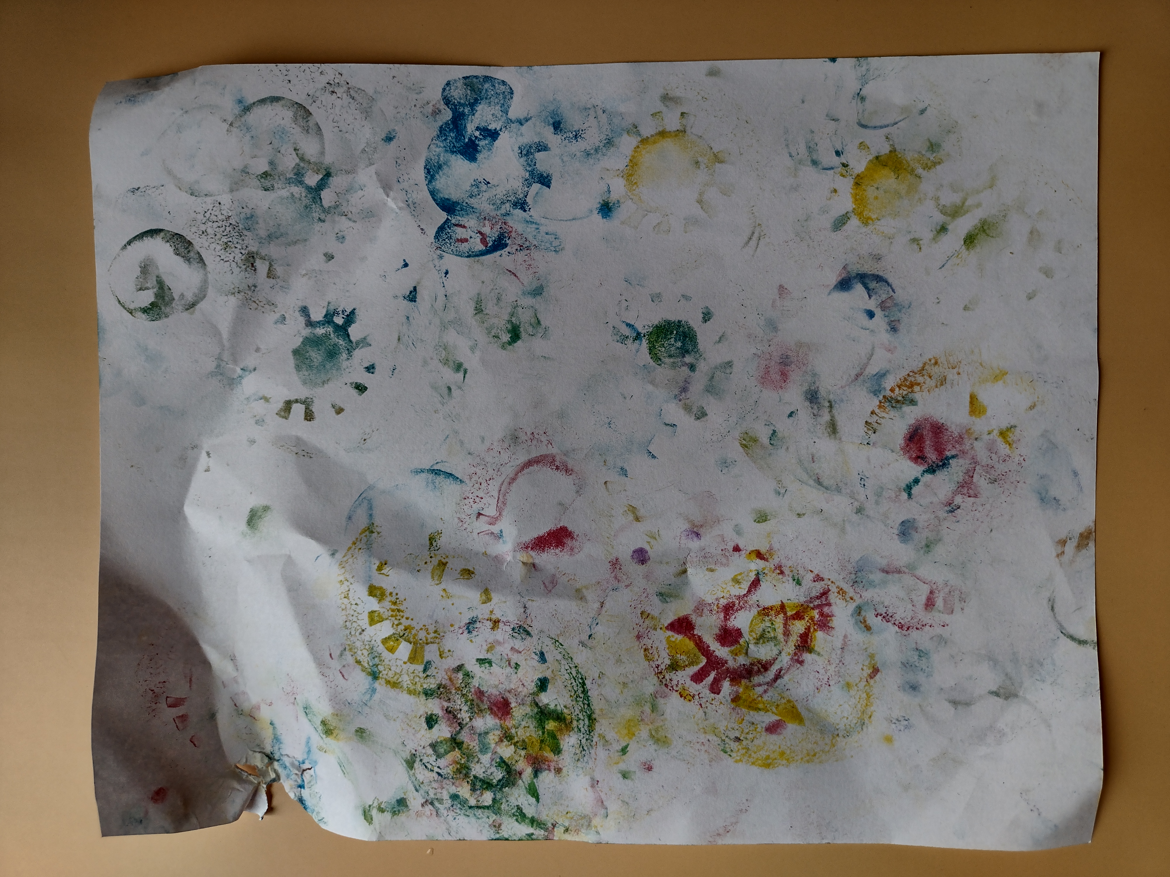 Picture of a piece of paper stamped by a toddler