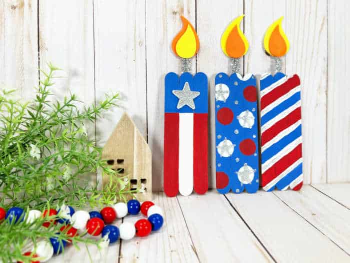 Picture of three firecracker popsicle stick crafts