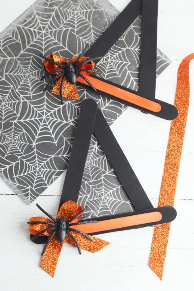 Picture of an orange and black witch's hat made from popsicle sticks